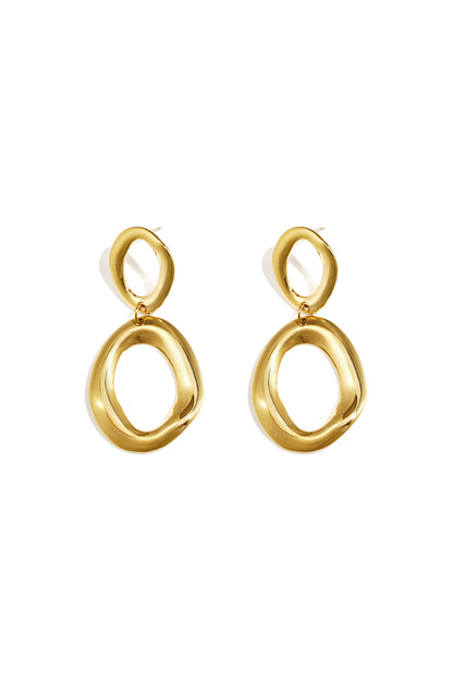 Statement oorbellen met organische ringen
