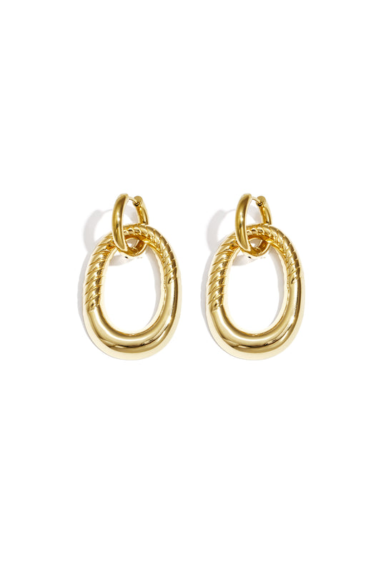 Statement oorbellen met gedetailleerde ovale hanger